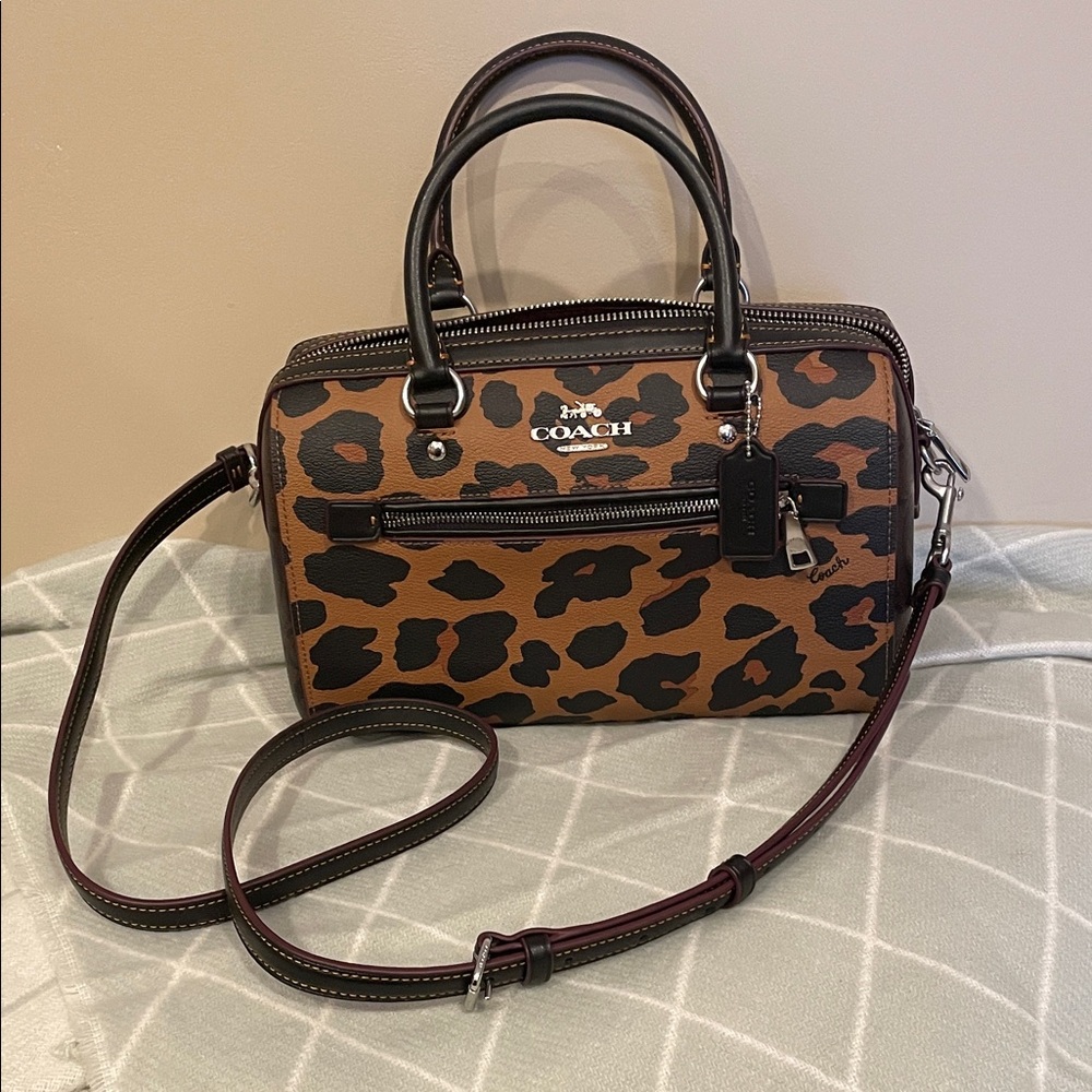 Coach Tan and Black Leopard Print handbag.